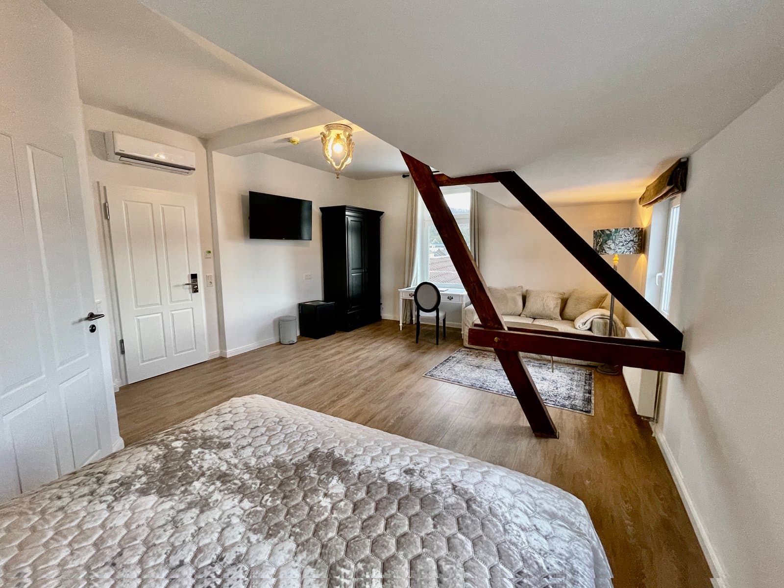 A cozy reading nook with a comfortable chair and lamp