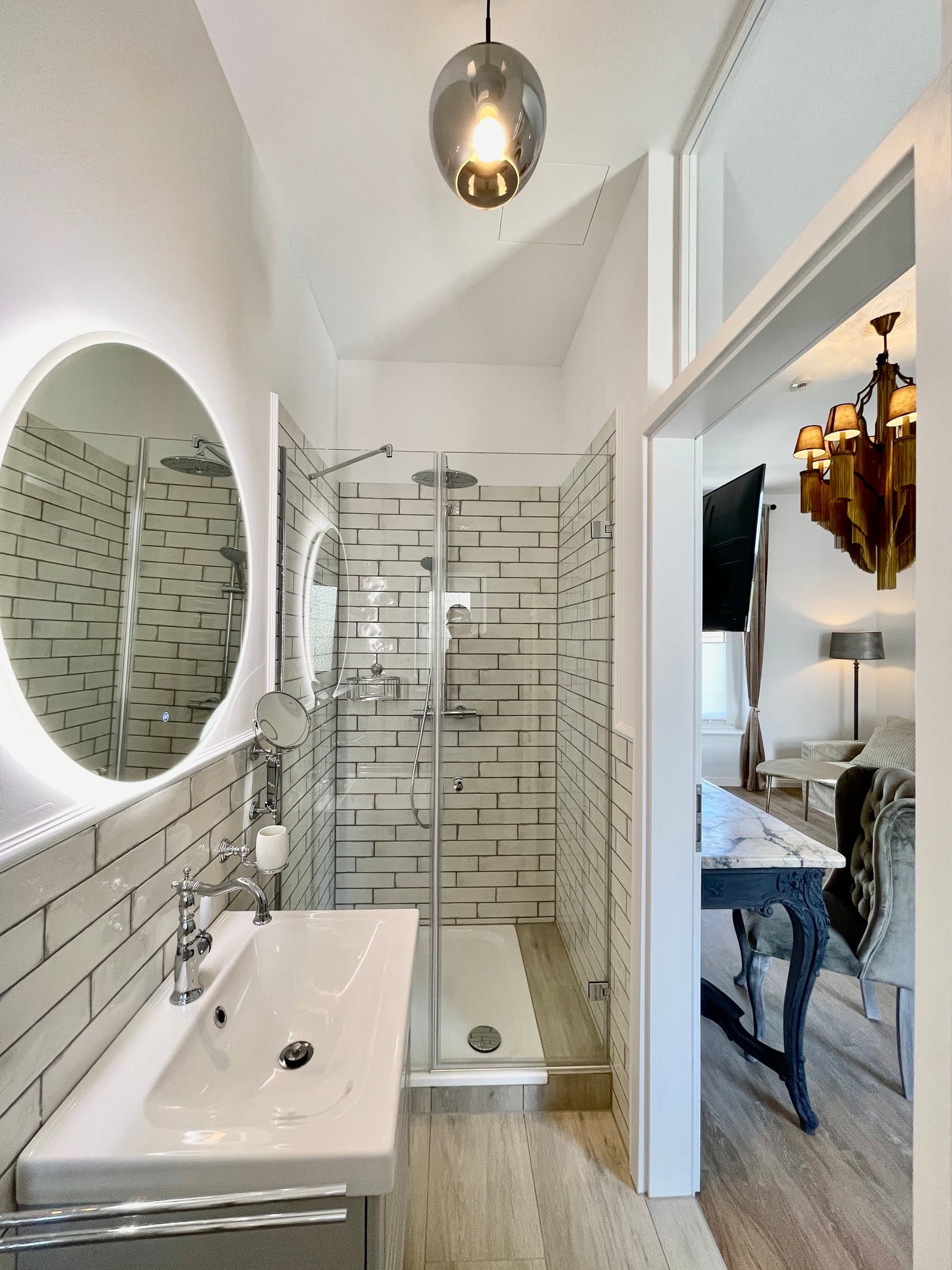 A clean and bright bathroom with a walk-in shower